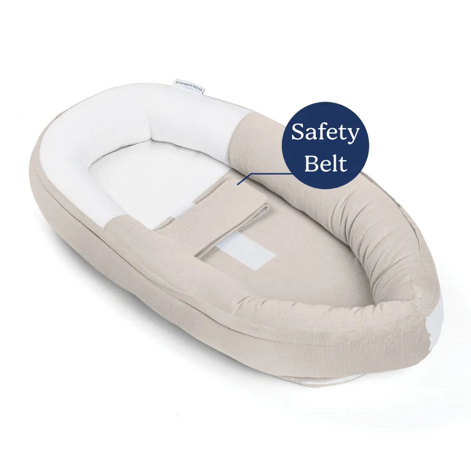 doomoo-cocoon-sicherheitsgurt-babynest-tetra-jersey-sand image 1